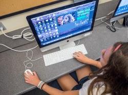 High school student working on computer